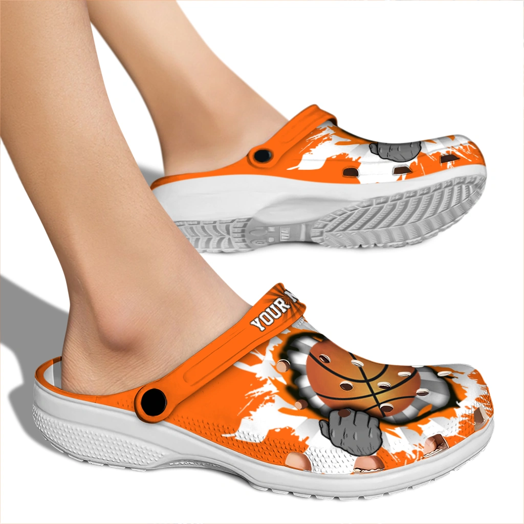 basketball logo clog customized gripping hand orange white fashion forward.webp basketball logo clog customized gripping hand orange white fashion forward.webp